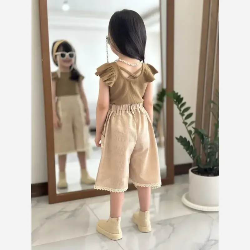 ست تاپ و شلوارک دخترانه طرح سلنا جنس پنبه و لنین سایز 2 تا 9 سال - تصویر 3