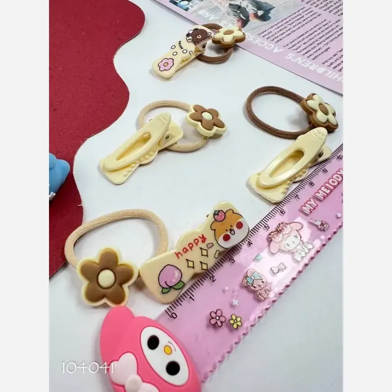 پک 4 عددی اکسسوری مو دخترانه شامل 2 عدد کش مو و 2 عدد گیره انبری وارداتی - تصویر 5