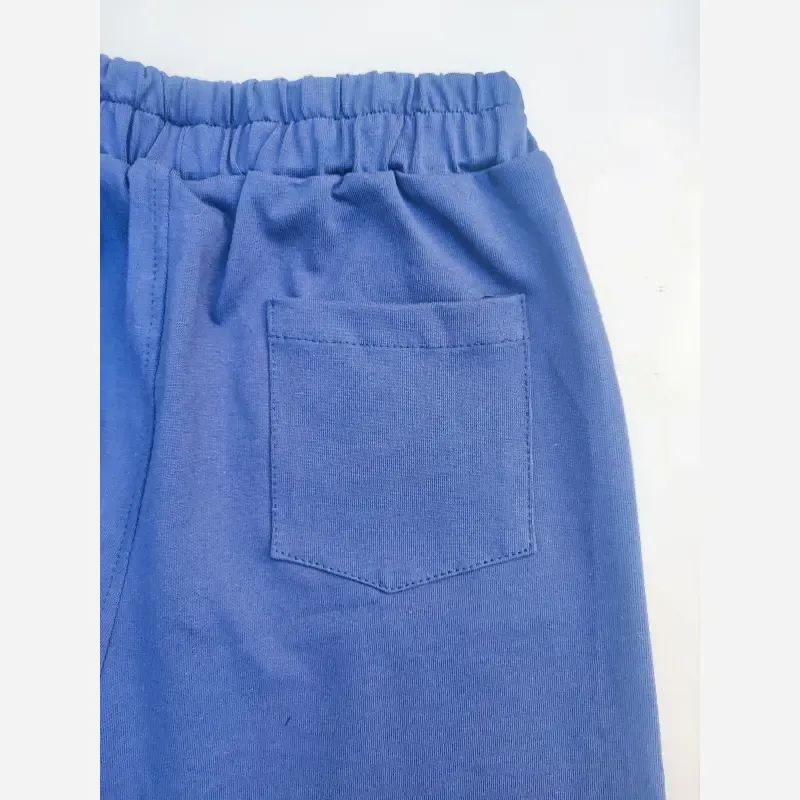 ست تیشرت و شلوارک اسپرت پسرانه و دخترانه طرح 1977 رنگ سرمه ای سایز 55 تا 75 - تصویر 6