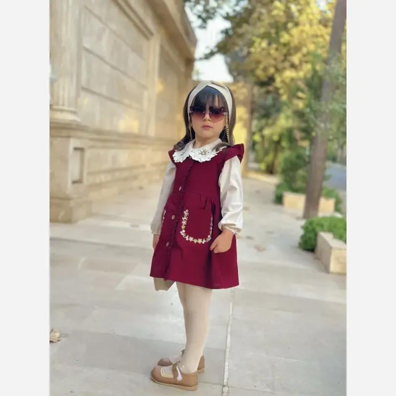 شومیز سارافون دخترانه لینن کتان زرشکی مناسب 3 تا 9 سال ست دو تیکه گلدوزی شده - تصویر 3