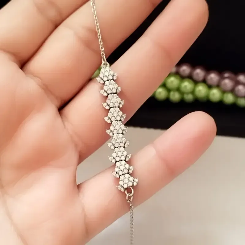 دستبند نقره زنانه عیار 925 طرح جواهری روکش طلا سفید وزن 4.49 گرم - تصویر 5