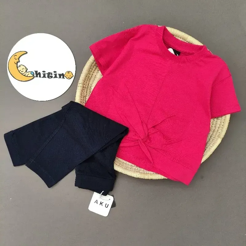 تیشرت کراپ گره ای آکو برای کودکان 2 تا 9 سال در رنگهای سرخابی و کرم - تصویر 2