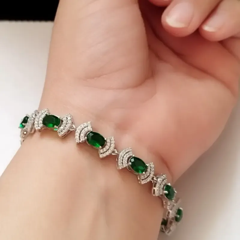 دستبند نقره زنانه عیار 925 با نگین زمرد سنتاتیک و روکش طلا سفید - تصویر 3
