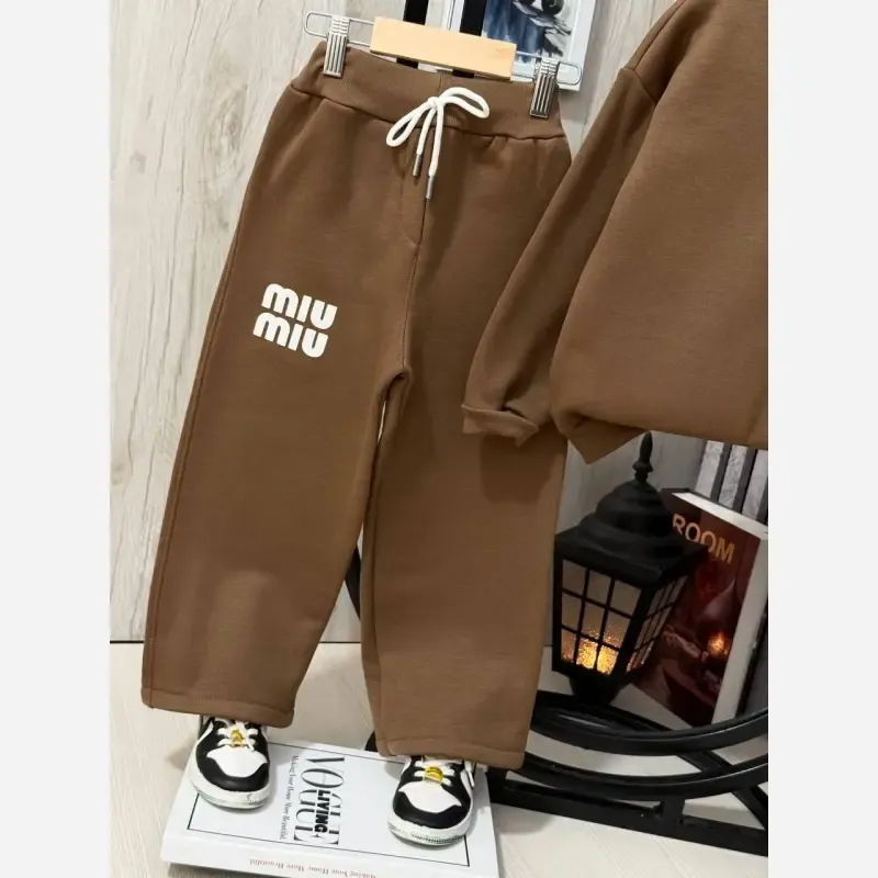 ست بلوز نیم زیپ و شلوار توکرکی مدل Miu Miu - تصویر 3